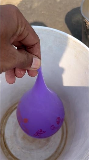 Experiment: Will a water balloon explode when it rolls down from a tall building?💥🎈#satisfying