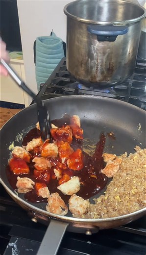 Preparing homemade General Tso’s chicken
