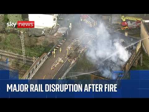 'Major disruption' for passengers across UK as London building burns near railway tracks