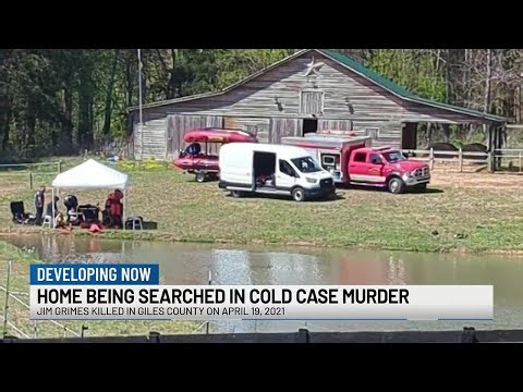 Home being searched in cold case murder
