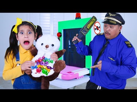 Ellie and Charlotte Try to Sneak Candy Pass Uncle Sam at Airport Security