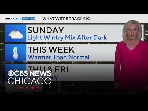 Light wintry mix in Chicago after dark on Sunday