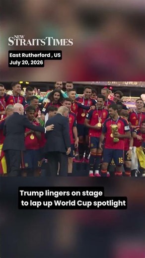 Trump lingers on stage to lap up World Cup spotlight