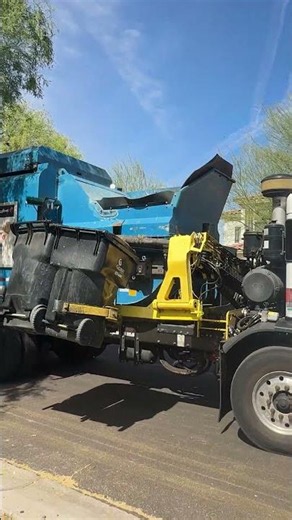 Garbage Truck Collects Two Bins At A Time!