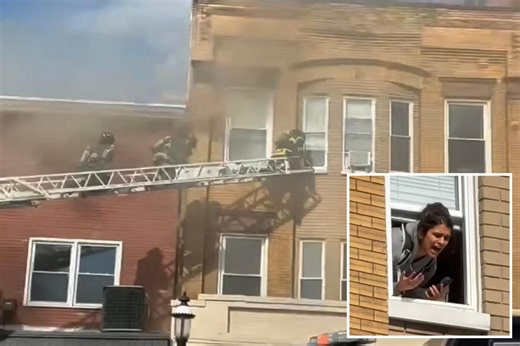 NJ firefighters rescue woman through top floor window of high-rise in dramatic video