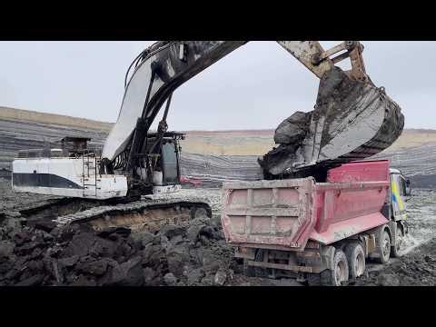 Caterpillar 375 Excavator Loading Overburden On A Fleet Of Mercedes And MAN Trucks