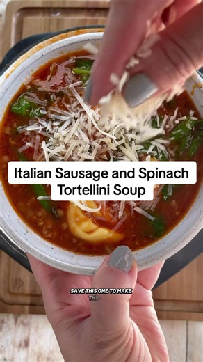 Italian Sausage and Spinach Tortellini Soup 🍁 Recipe below or in comments 1 tablespoon vegetable oil 1 pound ground Italian Sausage 1/2 cup diced onion about 1/2 medium sized onion 1 tablespoon minced garlic 1–28 oz can crushed tomatoes 1–32. oz. box of vegetable or chicken broth 2 tablespoons chopped basil 1 teaspoon salt 1/2 teaspoon pepper 1 9- ounce package refrigerated tortellini 2 cups packed fresh spinach Shredded/Grated parmesan for topping Heat a large, heavy bottomed pot over medium-h