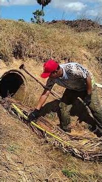 The Right Way to Clear Straw From a Blocked Ditch Pipe — Step by Step