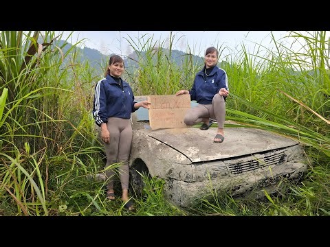 The girl bought a scrap car to repair and restore the entire car engine.