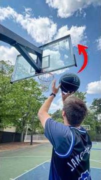 How far behind the hoop can I make it? 🤯 #basketball #trickshot #challenge #jakethejuice