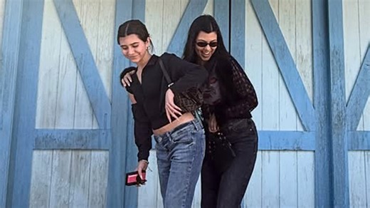 Penelope Disick is growing up fast and now towers over mom Kourtney Kardashian during their fun visit to the ‘Gilmore Girls’ set. | Entertainment Tonight