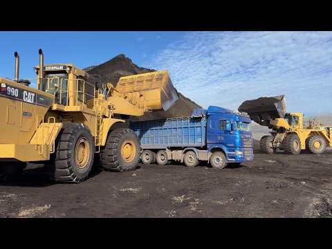 Two Cat 990 Wheel Loaders Loading Coal On Trucks At Massive Mine Deposit - S.G.M Melidis - Ektor 4K