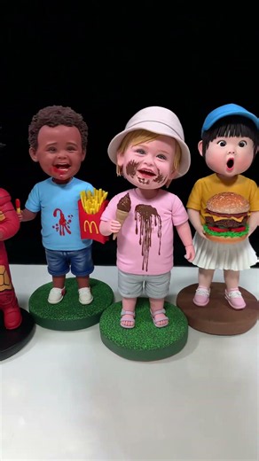 Adorable Clay Bobbleheads Handmade with Happy Hearts