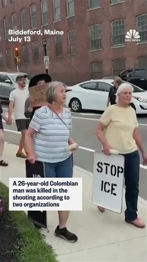 Protesters hold a vigil for the victim of the ICE shooting in Maine