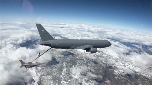 Watch a B-2 stealth bomber fly directly behind a KC-46 and take fuel in mid-air