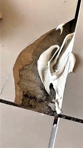 Repairing process of broken floor tiles with new adhesive