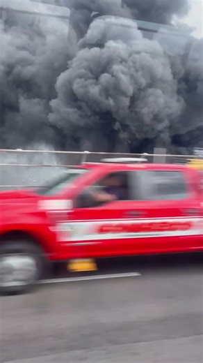 Huge Smoke Plume Near Moving Traffic as Tanker Trucks Burn Under Bridge of the Americas