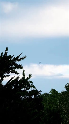 🛸 Close Encounter: UFO Escorted by Jets in Wilderness Footage! 👀