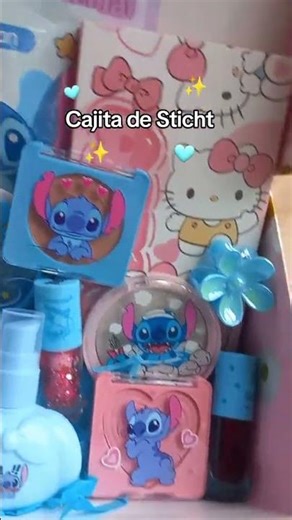 Stitch_blue_alien_character_from_Lilo_and_Stitch_holding_wrapped_gift_box
