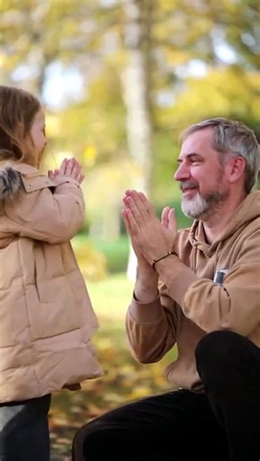 Pure joy: Teaching Grandpa the ultimate hand-clapping game!