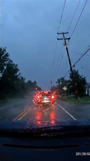 Power Line Crashes Onto Road — Terrifying Dashcam Near Miss!