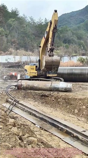 Excavator Moves HDD Pilot Bit Back and Forth on Ground for Pre-Drilling Prep
