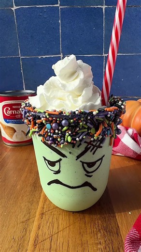 Deliciously easy monster milkshake! Save this for Halloween! 🎃 #halloweendrinks #milkshake #easydessert #halloweenfood #carnationmilk Monster Milkshake Makes 1 large milkshake or 2 small 3 cups vanilla ice cream 1/2 cup Carnation Evaporated Milk Green food coloring White canned frosting Purple food coloring or food coloring of choice Halloween sprinkles How to make monster milkshakes 1. Mix frosting with food coloring until your desired color is reached. Pour sprinkles onto a plate. Use a knife