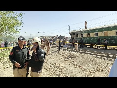 Train flipped, cars burnt after deadly bomb attack in Pakistan's Quetta city | AFP