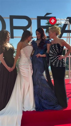 Cannes 2026 ( in white and bold) with a full image of Aishwarya in the blue gown