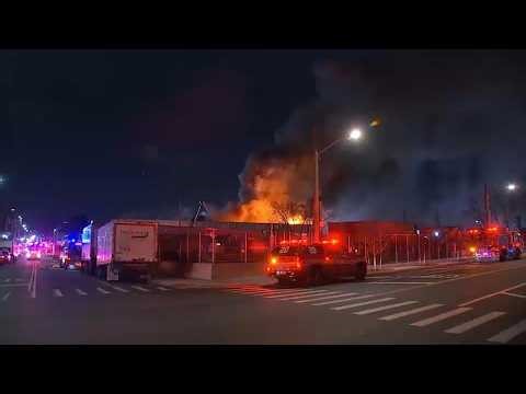 Fire rips through industrial complex in Queens