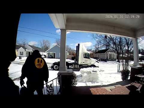 Truck Driver Slips on Ice While Carrying Paintball Tanks || ViralHog