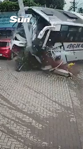 Moment coach CRASHES into petrol station