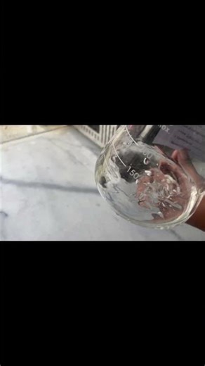 Shaking Lactose solution in Flask for Complete Dissolution#lab procedure#microbiologylab #shortsfeed