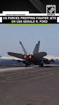 US forces prepping fighter jets for take-off over aircraft carrier USS Gerald R. Ford