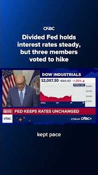Divided Fed holds interest rates steady, but three members voted to hike