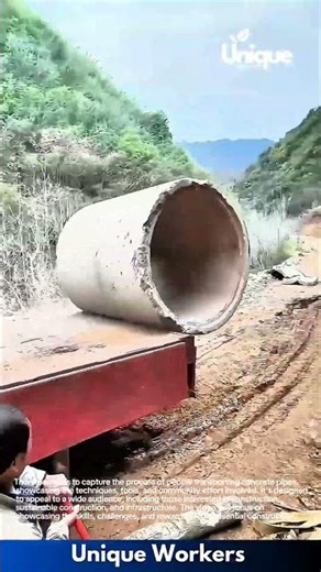 Massive Concrete Pipe Unloading: Man Safely Positions Heavy Cement Ring from Truck