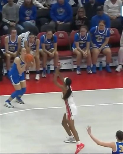 Gianna Kneepkens draws the and-1 from the three point line