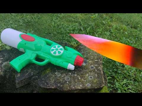 TOY GUN CUT WITH A GLOWING 1000 DEGREE KNIFE! - Experiment