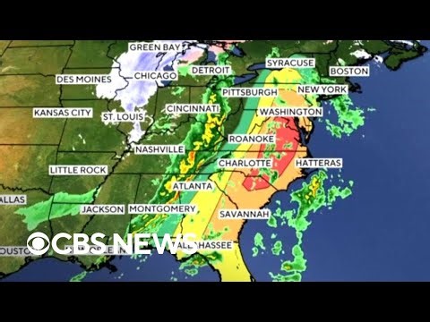 Snow slams parts of the Midwest as the East Coast braces for severe storms