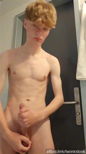 A cute ginger twink jerks off his cock