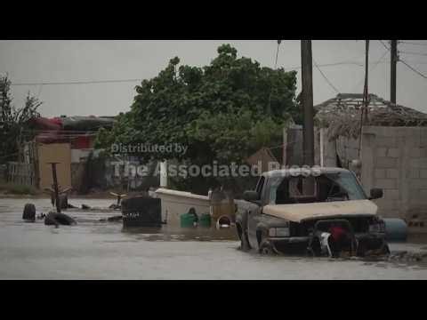 Floodwaters force evacuations as Hurricane Polo bears down on Mexico