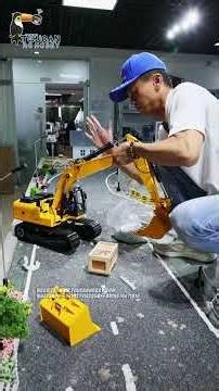 can boost the digging power of this 1/12 scale RC hydraulic excavator 323GX by adding steel balls!