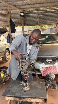 Mechanic Fixing Shock Absorber Spring