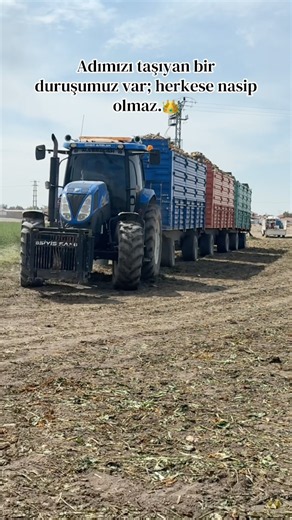 New Holland tractor pulling a 100-ton beet trailer