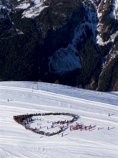 Skiers in Switzerland formed a heart to honor the dozens of people killed when a fire tore through a New Year's celebration in a crowded bar. #switzerland #abcnews
