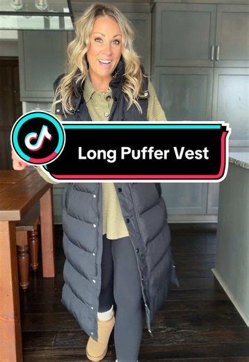 This long puffer vest is a must for the cooler weather! ✨ I love that the side snaps open up, so even though it’s long, it doesn’t feel restrictive when you’re walking, driving, or sitting down. You also have both a zipper and snap closure, plus pockets and a great hood! It’s warm and cozy while still leaving your arms completely free—perfect if you don’t love wearing a bulky winter coat. And the color options are SO good! Grab your size and color now before cooler weather hits because I can see