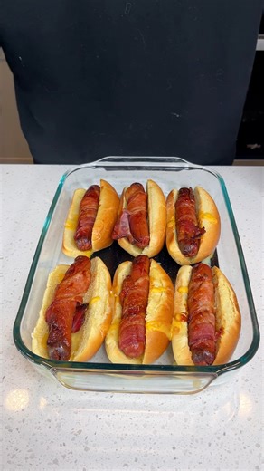 The only hotdog recipe you need Brian L makes a bacon wrapped hotdog dinner with a barbecue sauce glaze This original video was produced by Network Media, and Brian L | Family Style Cooking