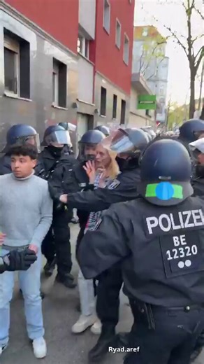 ⛔️Moment of the German police arresting a young woman among hundreds of Germans protesting the law executing Palestinian prisoners held in occupation prisons..✊🏼