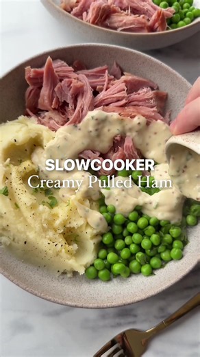 Slowcooker Creamy Mustard Pulled Ham This recipe reminds me of my childhood. My mum would always make this although the sauce was maybe from a sachet 😂, so easy to make, full recipe is below. PS If you want seriously easy Slowcooker throw and go recipes my new Prep & Go is out soon. Comment PREP for 100 recipes in it, it’s half price Ingredients: ⁠- 1kg gammon minimum (Steep overnight before cooking to remove salt) ⁠- 500ml of chicken stock or cider For the creamy parsley sauce: - 600ml milk - 