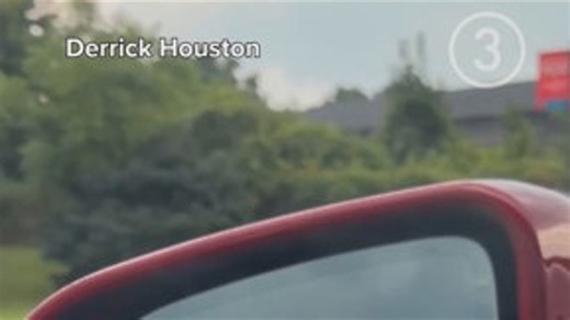 Twister captured in driver's side mirror in Youngstown